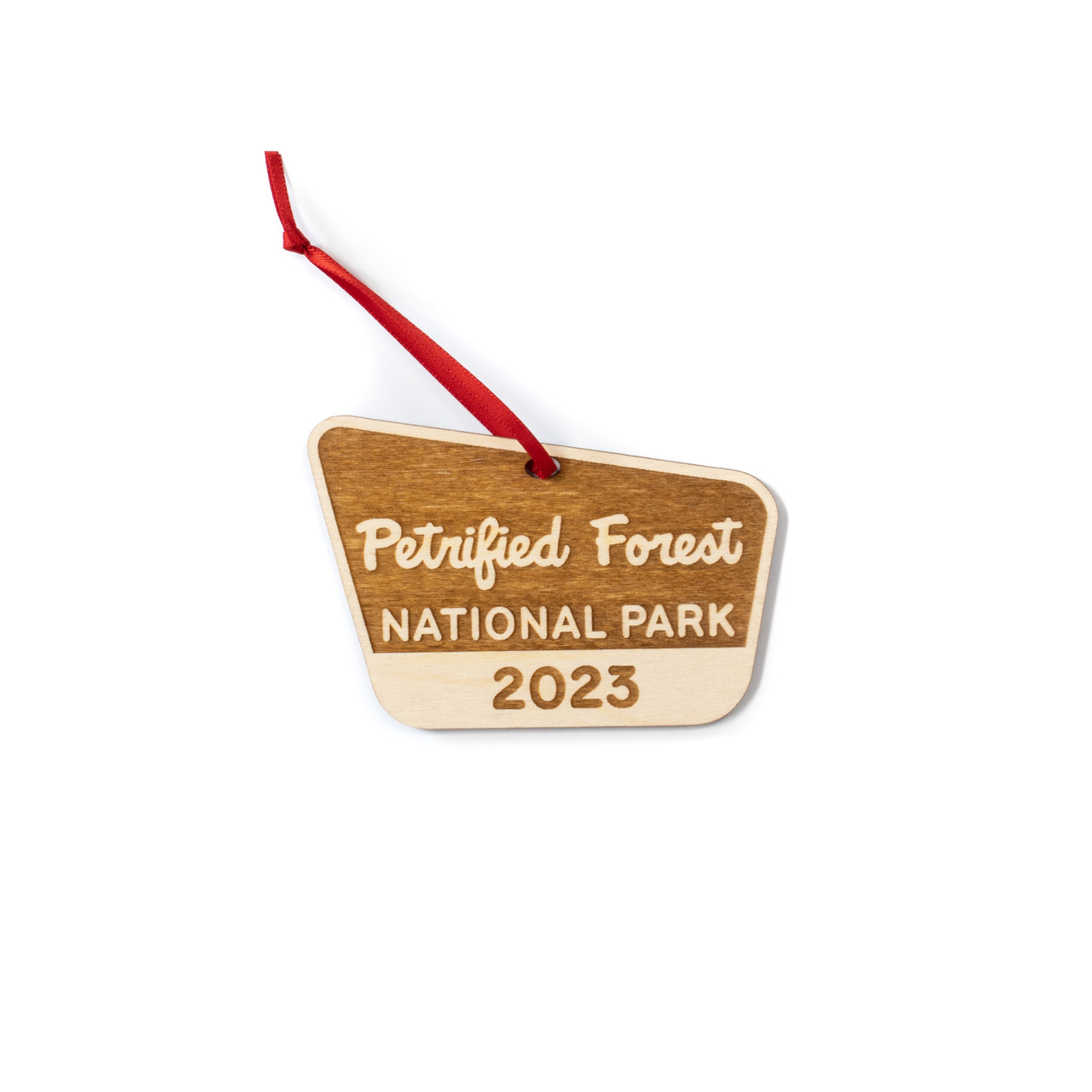 A charming engraved wooden ornament of Petrified Forest National Park: A perfect souvenir to remember the stunning landscapes and natural beauty of the park.