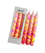 Neon hand marbled candle in pink, orange, and yellow, packaged in a pretty foiled white gift box