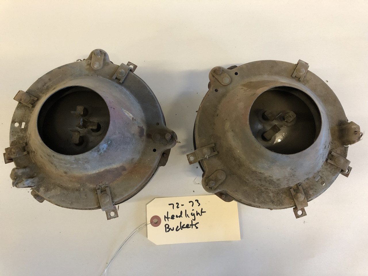 Used 72-73 Commando headlight bucket complete pair