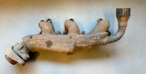 Used 1971 RH 225 V6 exhaust manifold with heat riser sheet metal