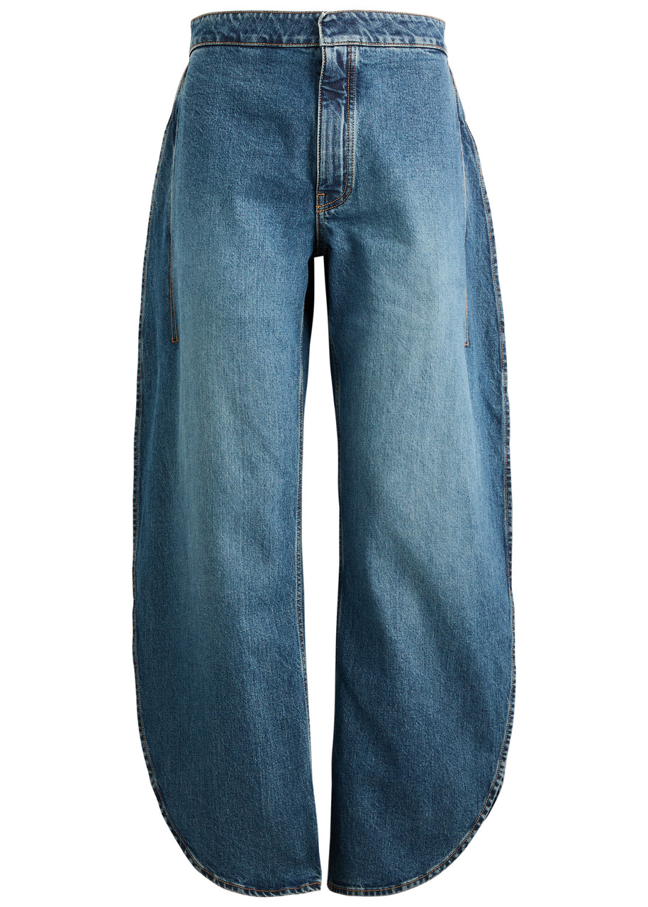 ALAÏA Petal barrel-leg jeans | Harvey Nichols
