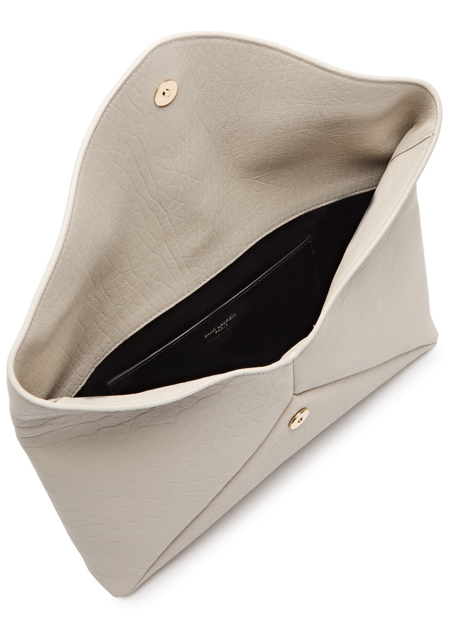 SAINT LAURENT Cassandre large grained leather pouch | Harvey Nichols