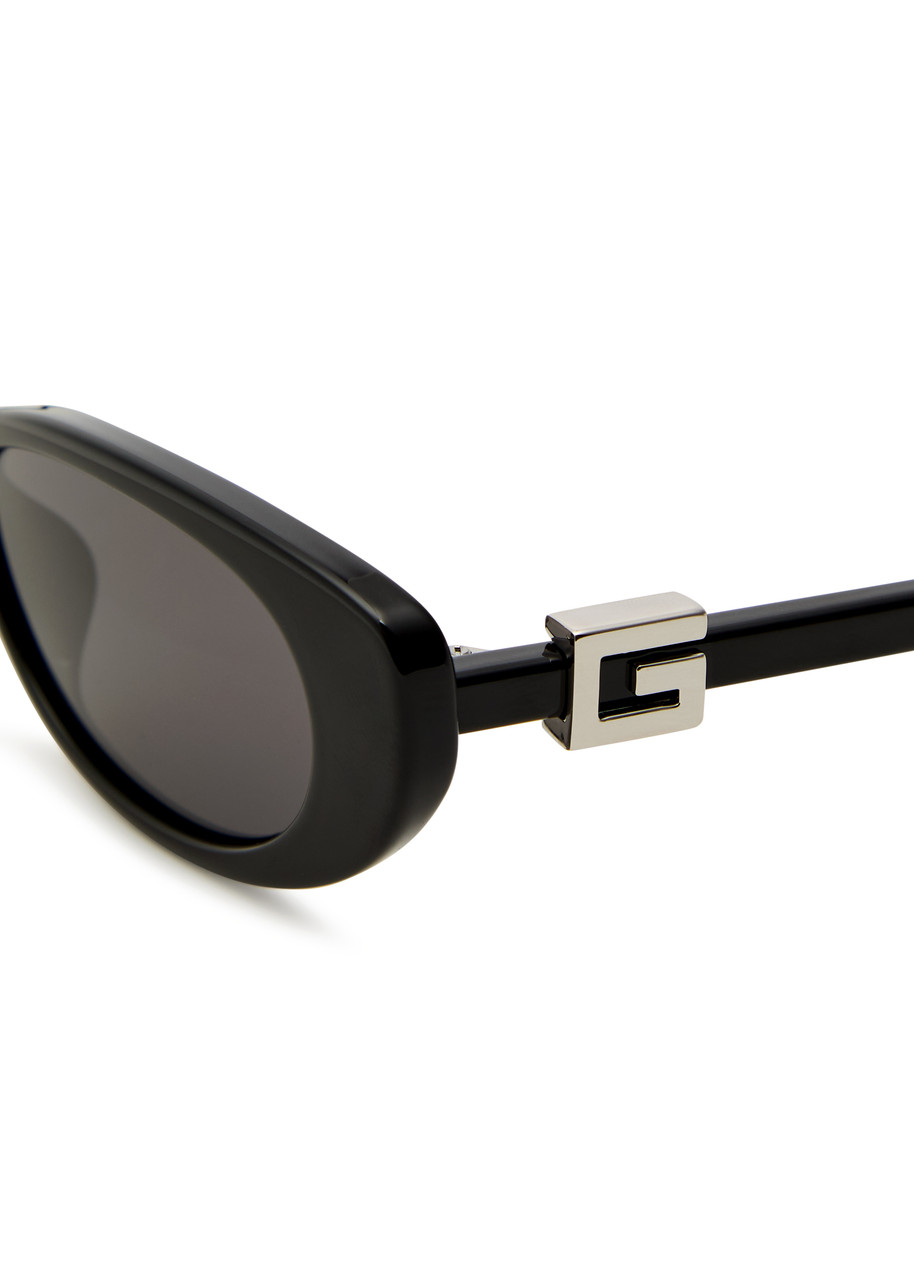 GUCCI Oval-frame sunglasses | Harvey Nichols