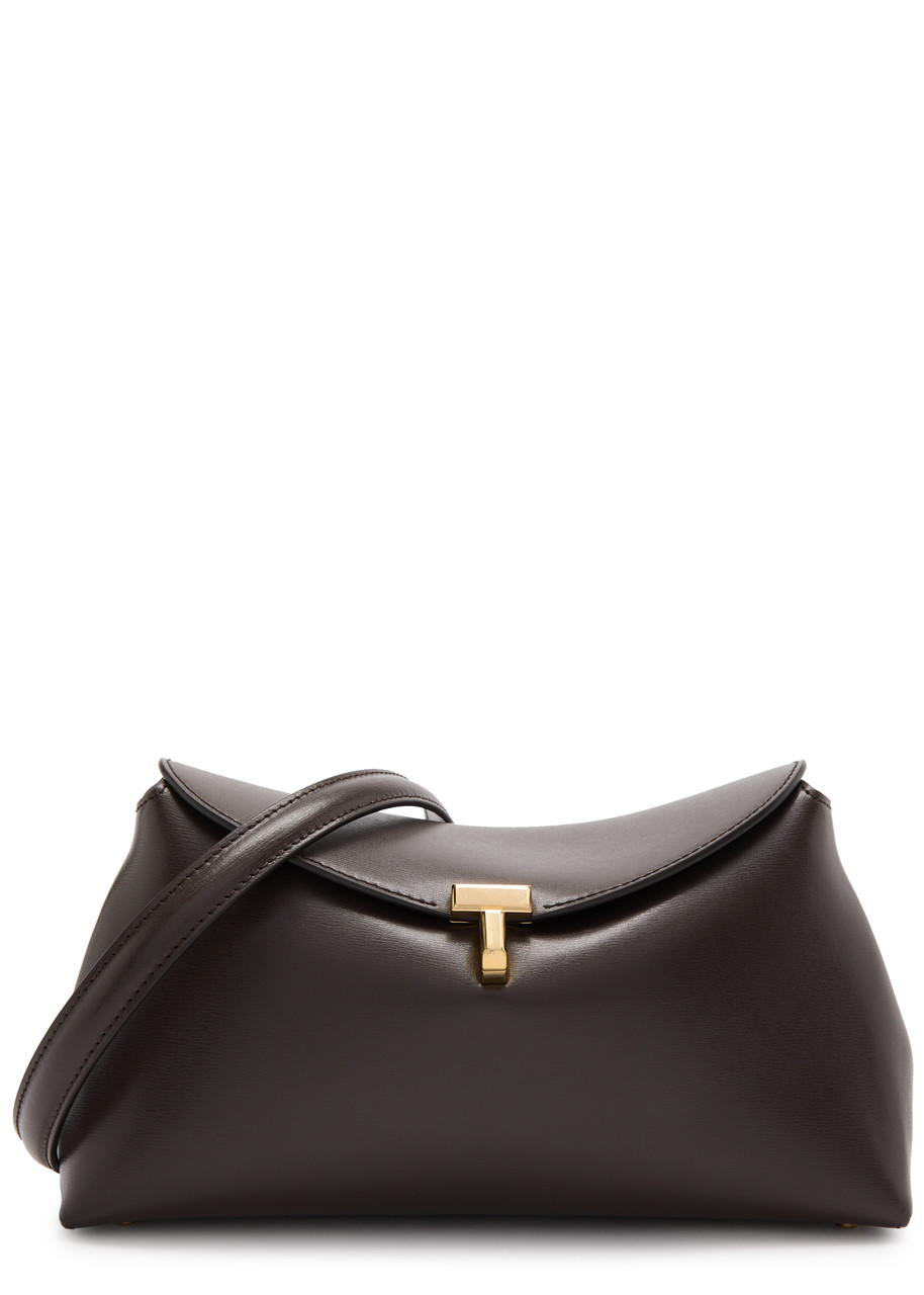 TOTEME T-Lock leather clutch | Harvey Nichols