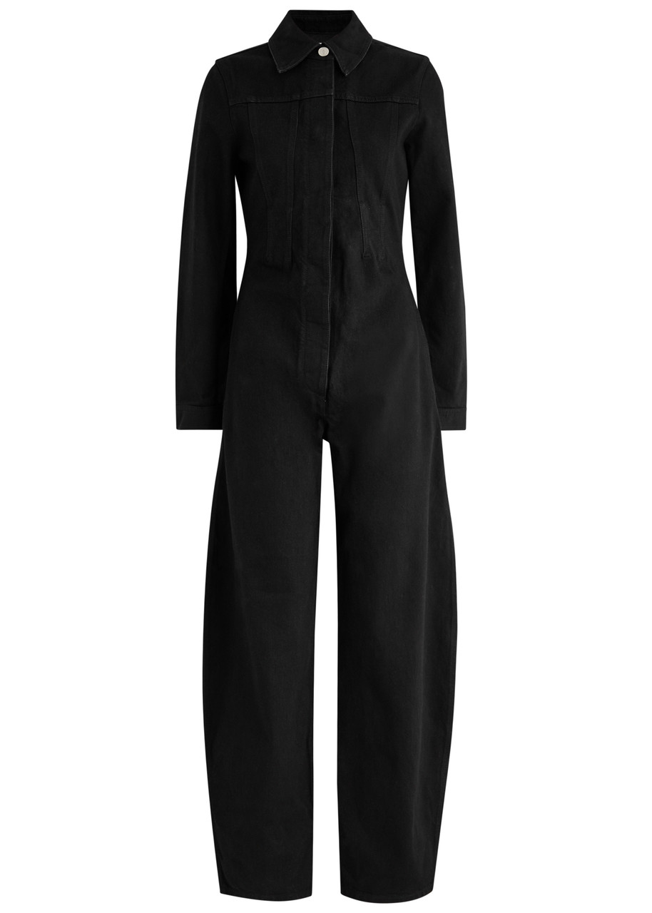 ALAÏA Darted denim jumpsuit | Harvey Nichols