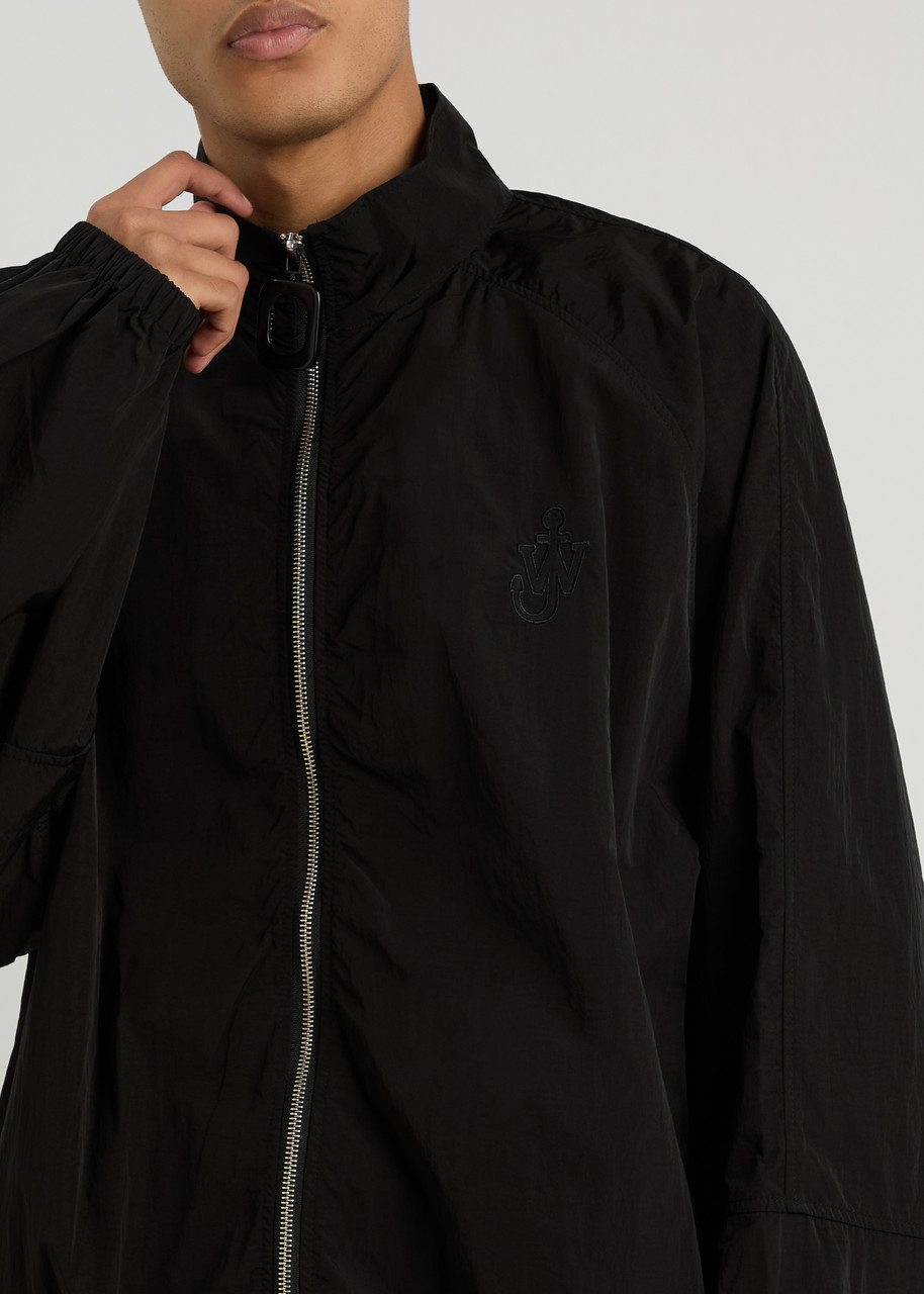 JW ANDERSON Logo-embroidered nylon track jacket | Harvey Nichols