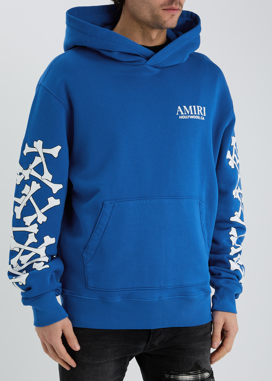 AMIRI Bones Stacked hooded cotton sweatshirt | Harvey Nichols
