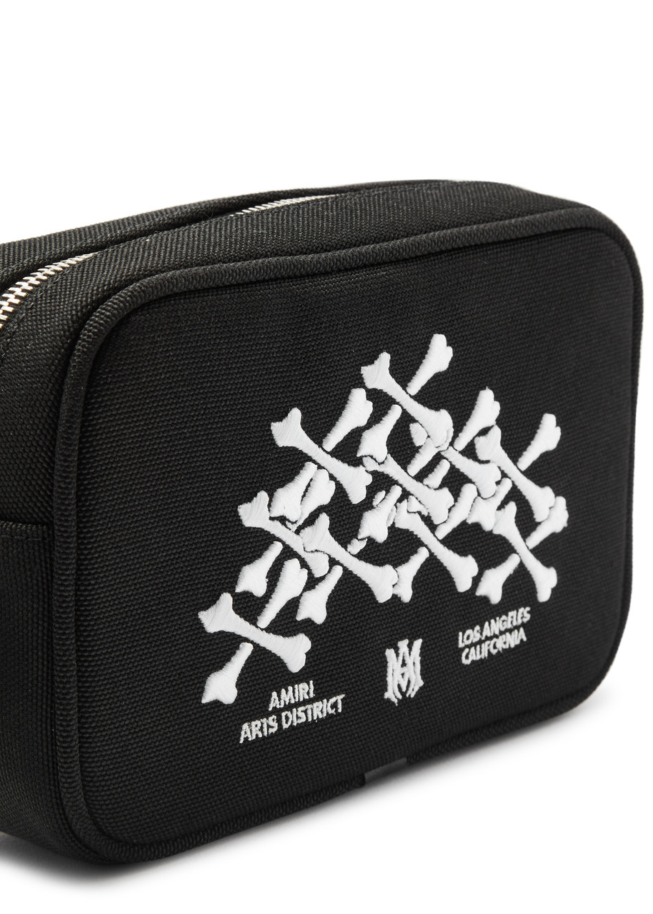 AMIRI Bones Stacked canvas camera bag | Harvey Nichols