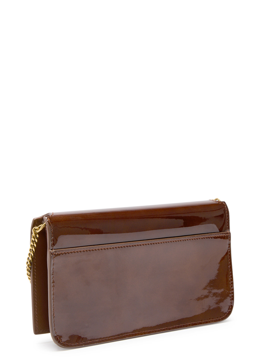 SAINT LAURENT Cassandre patent leather phone case | Harvey Nichols