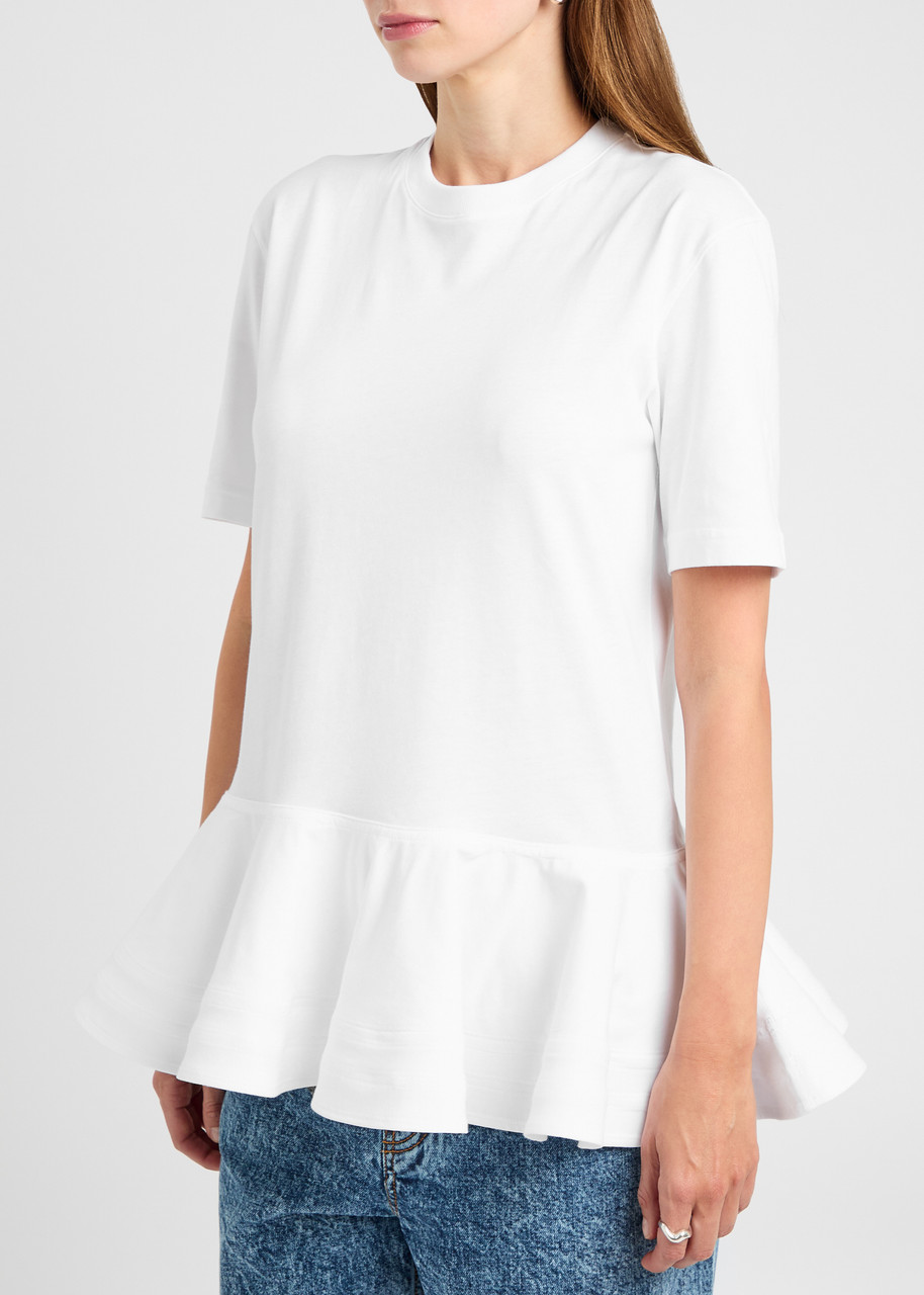 ALAÏA Peplum cotton T-shirt | Harvey Nichols