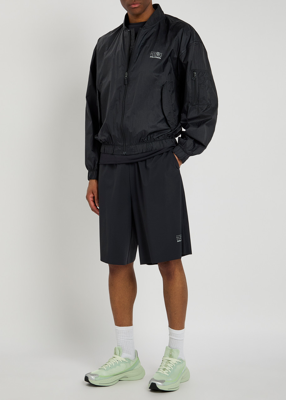 MM6 X SALOMON Reflective logo-print shell bomber | Harvey Nichols