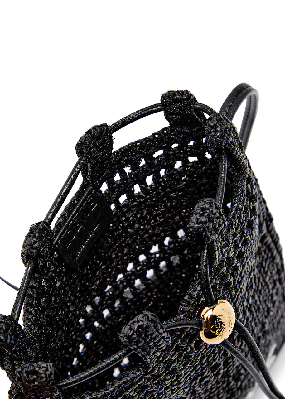 LOEWE X Paula's Ibiza Drawstring logo raffia pocket bag | Harvey