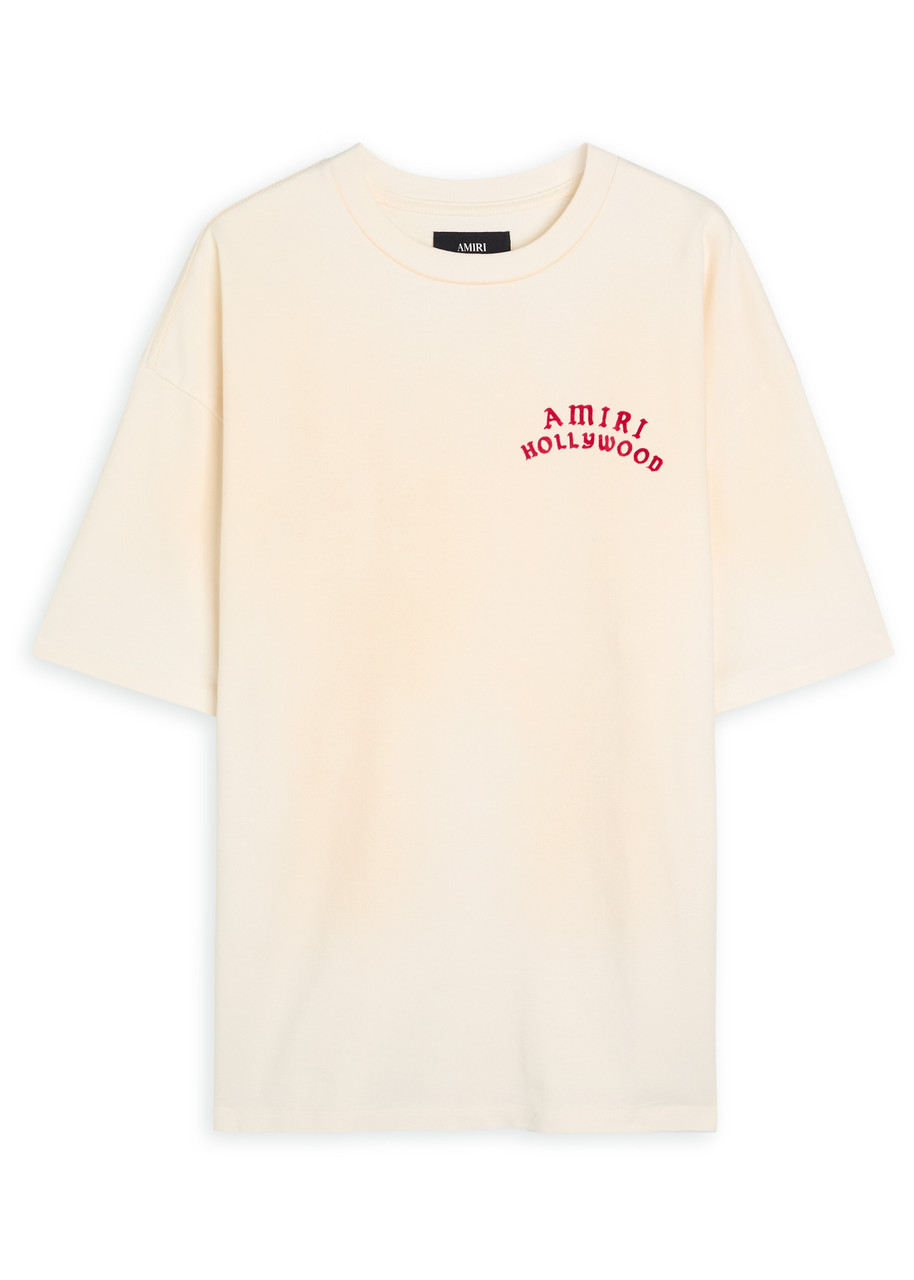 AMIRI Hollywood logo-appliquéd cotton T-shirt | Harvey Nichols AMIRI Hollywood logo-appliquéd cotton T-shirt | Harvey Nichols