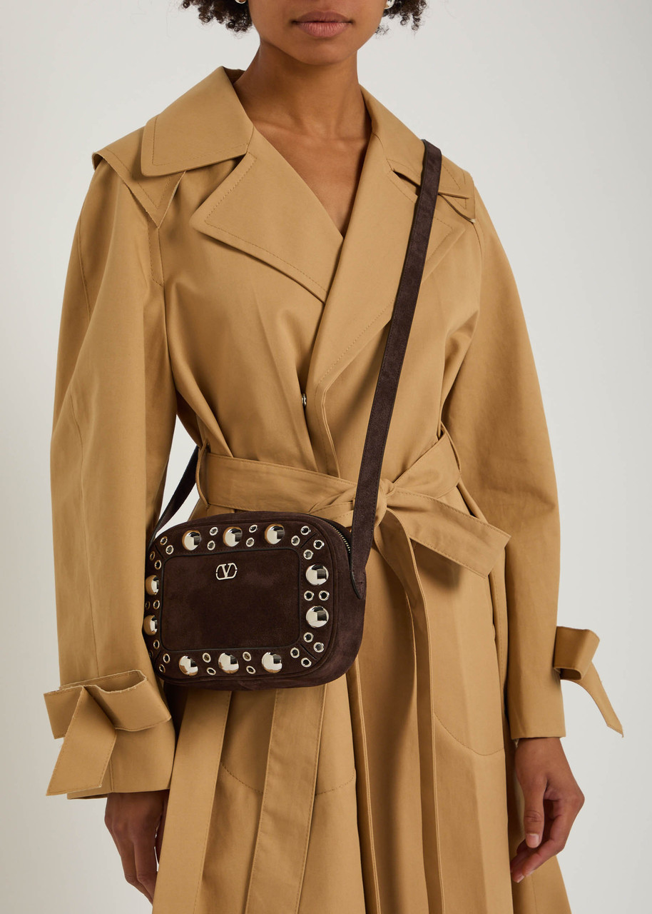 VALENTINO GARAVANI Nellcôte studded suede cross-body bag | Harvey