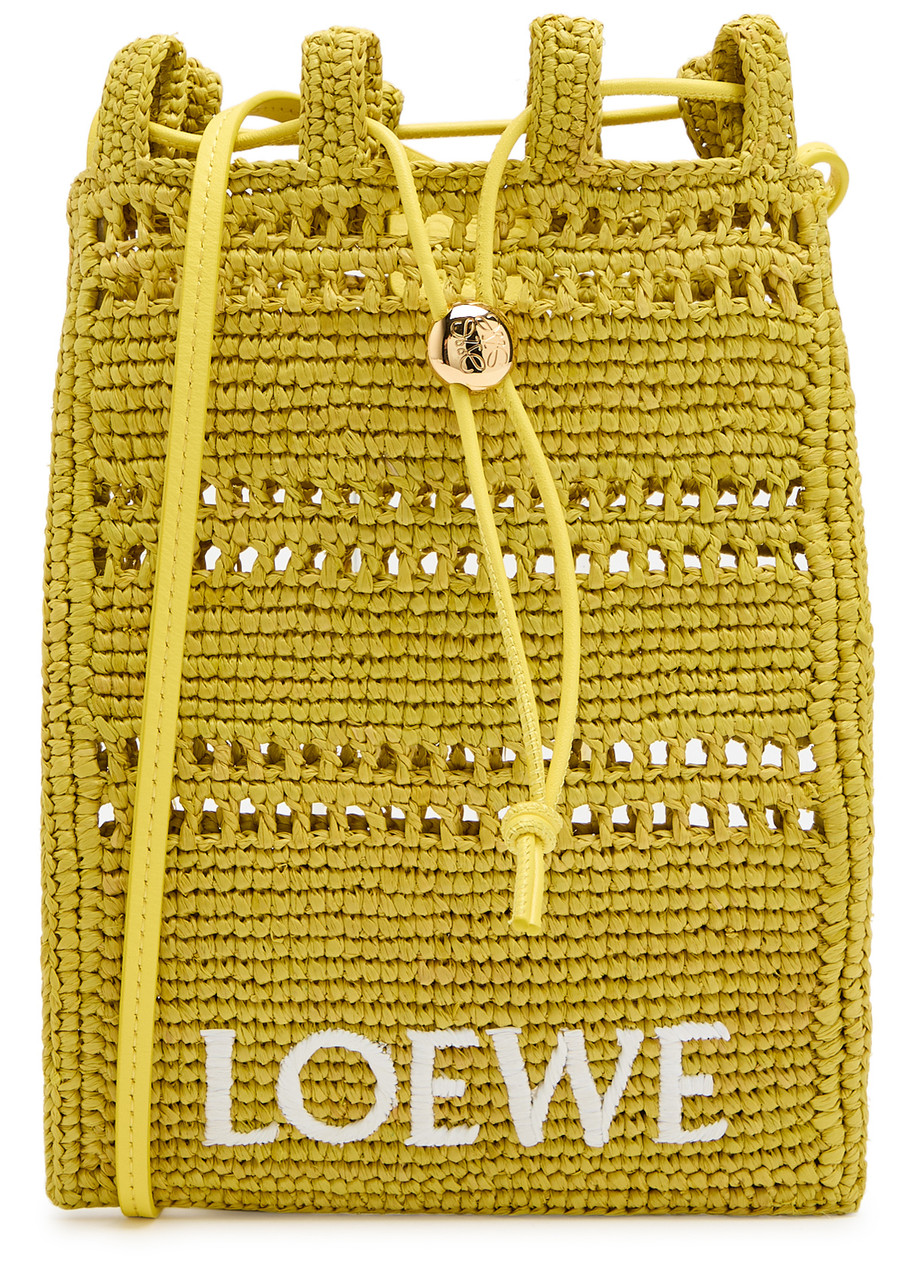 LOEWE X Paula's Ibiza Drawstring logo raffia pocket bag | Harvey