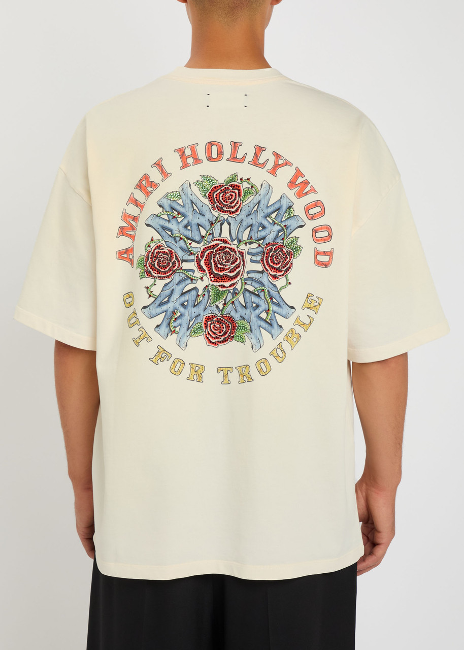 AMIRI Out For Trouble printed cotton T-shirt | Harvey Nichols