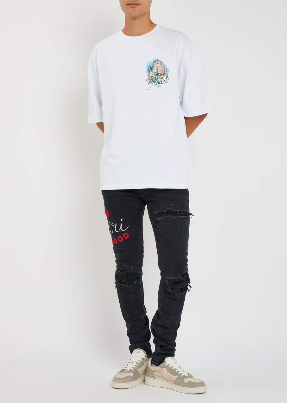 AMIRI Club Amiri MX1 appliquéd skinny jeans | Harvey Nichols