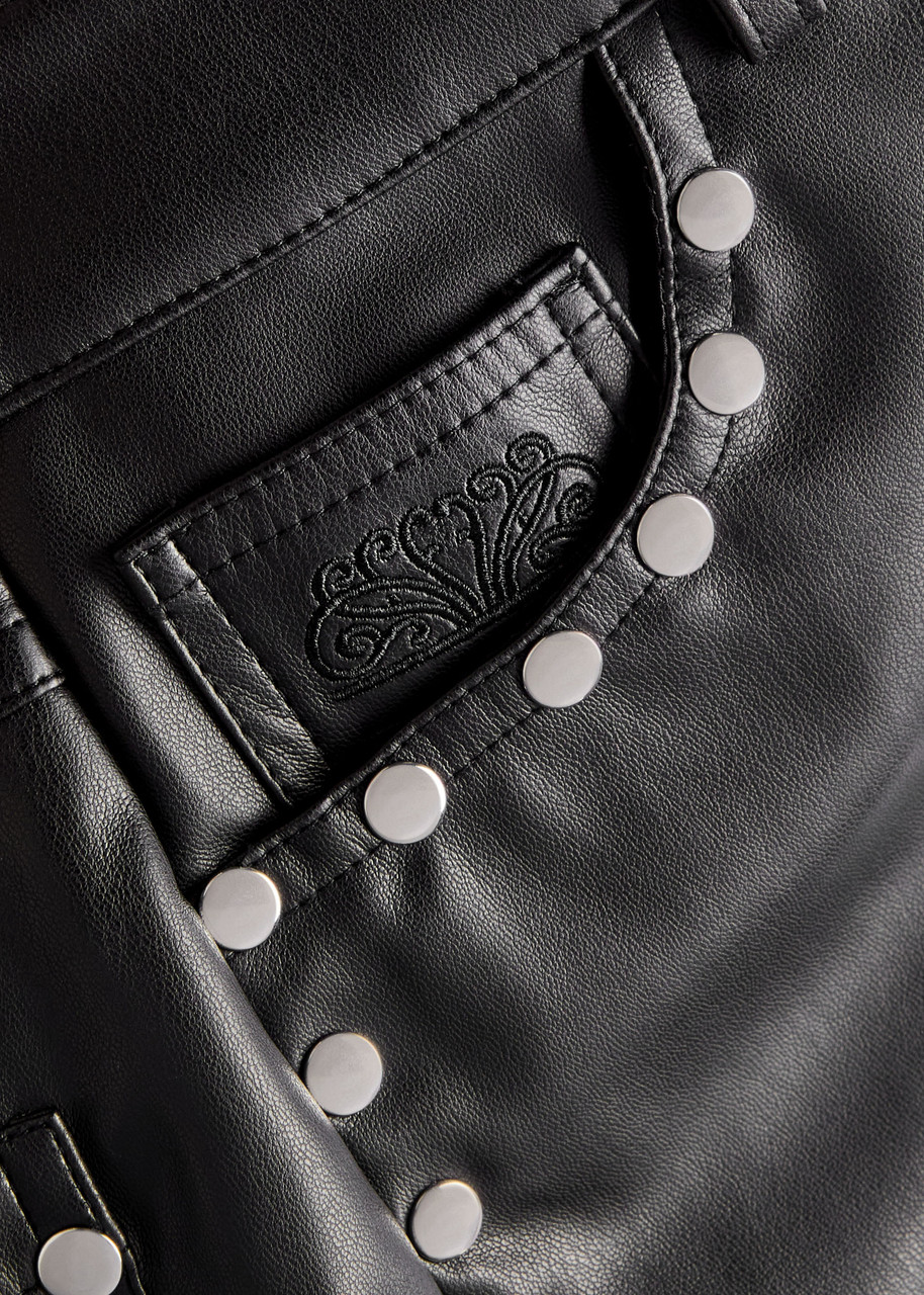 NEVER FULLY DRESSED Stud-embellished faux leather trousers