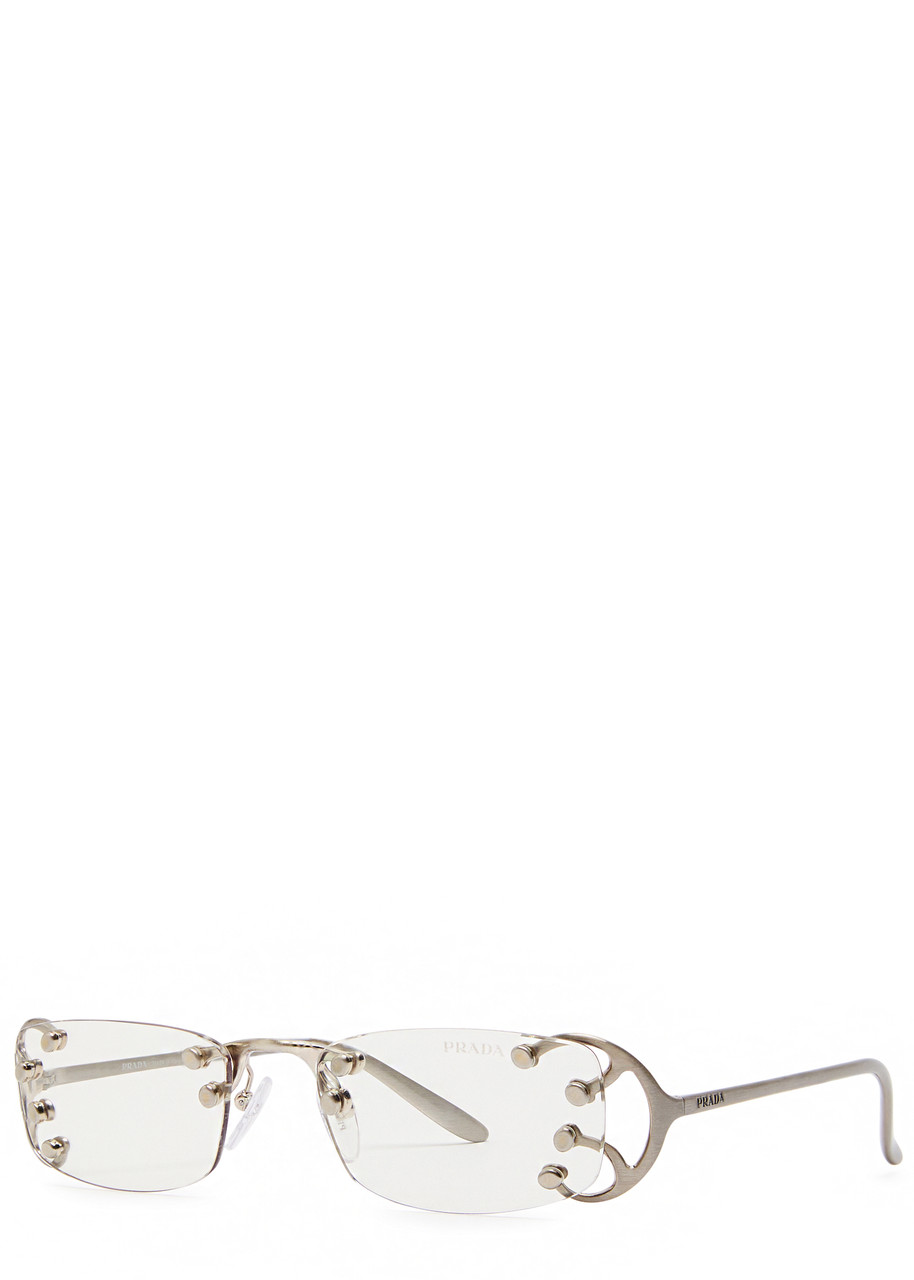 PRADA Narrow rimless sunglasses | Harvey Nichols
