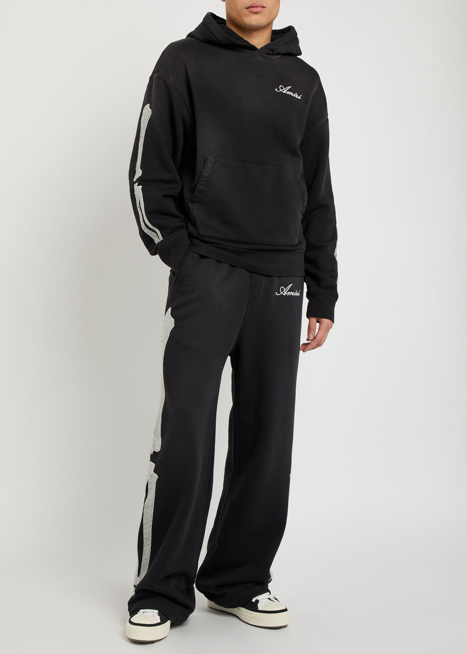 AMIRI Amiri Bones embroidered cotton sweatpants | Harvey Nichols