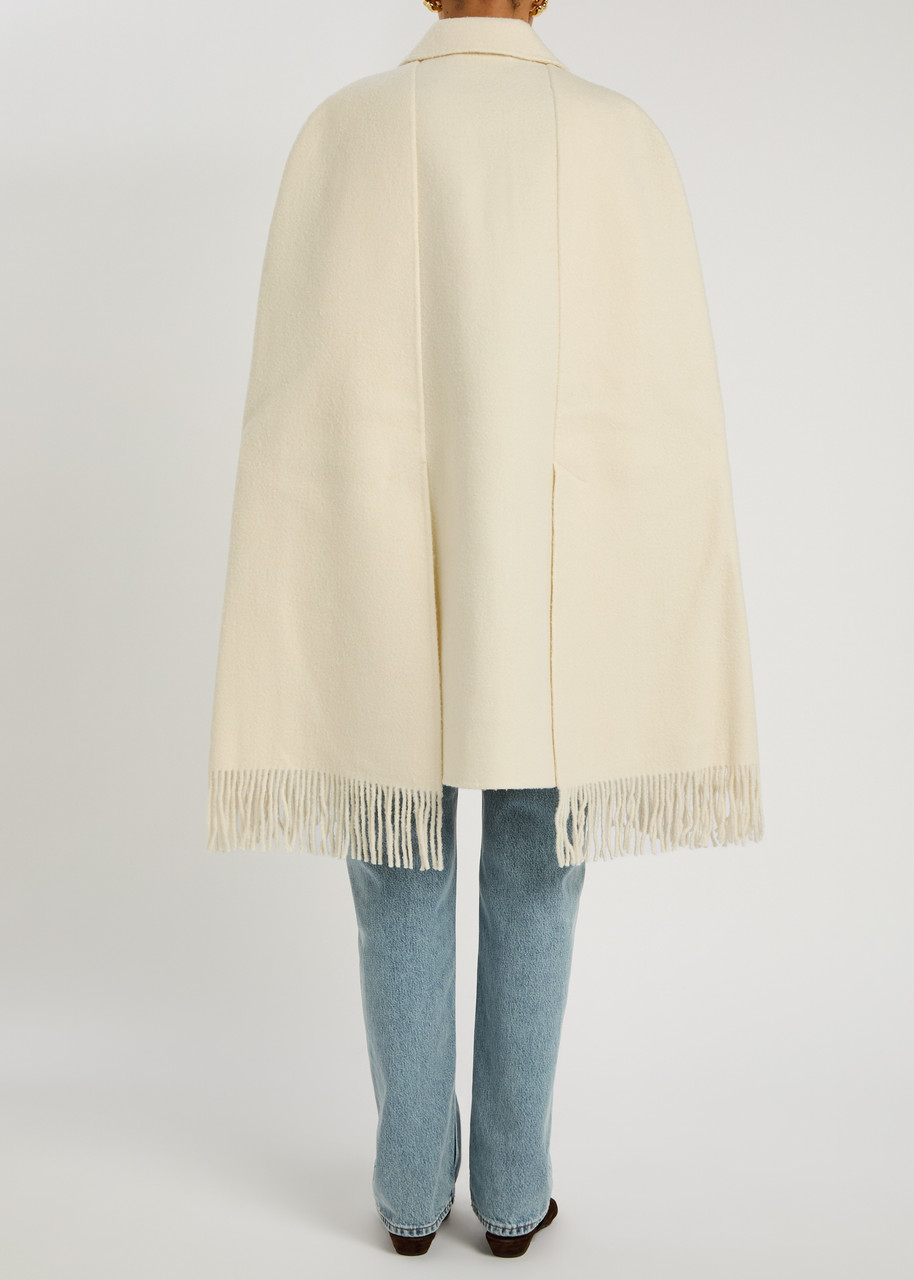 TOTEME Fringed wool-blend cape coat | Harvey Nichols