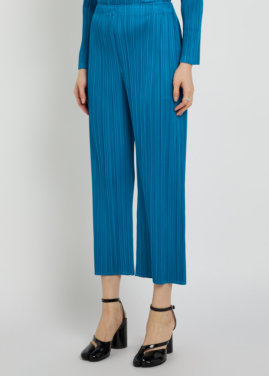 PLEATS PLEASE ISSEY MIYAKE Pleated wide-leg trousers | Harvey Nichols