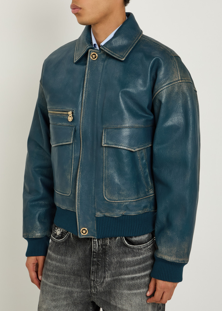 VERSACE Logo-embossed distressed leather jacket | Harvey Nichols