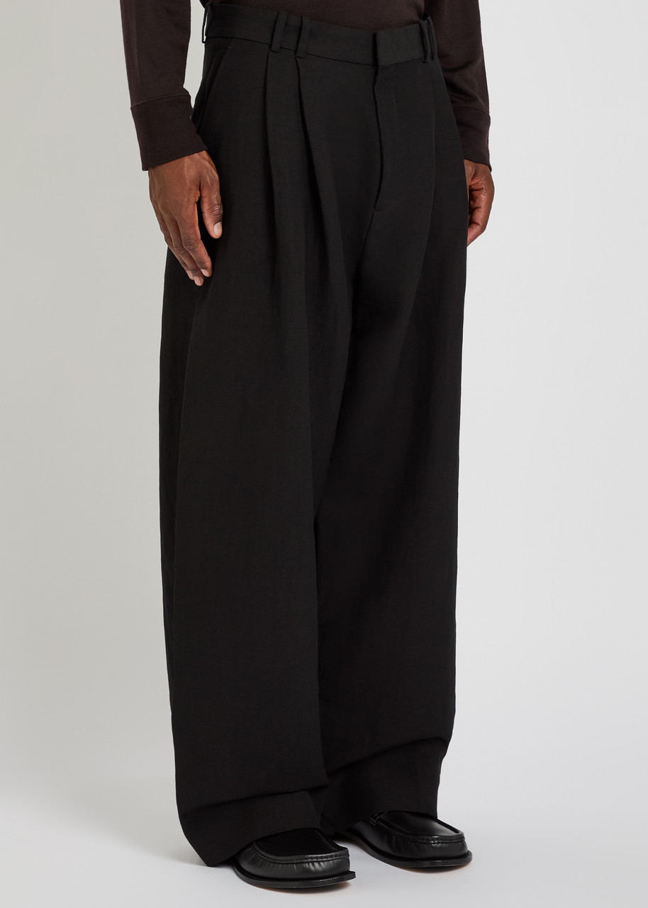 STUDIO NICHOLSON Line pleated linen and wool-blend trousers