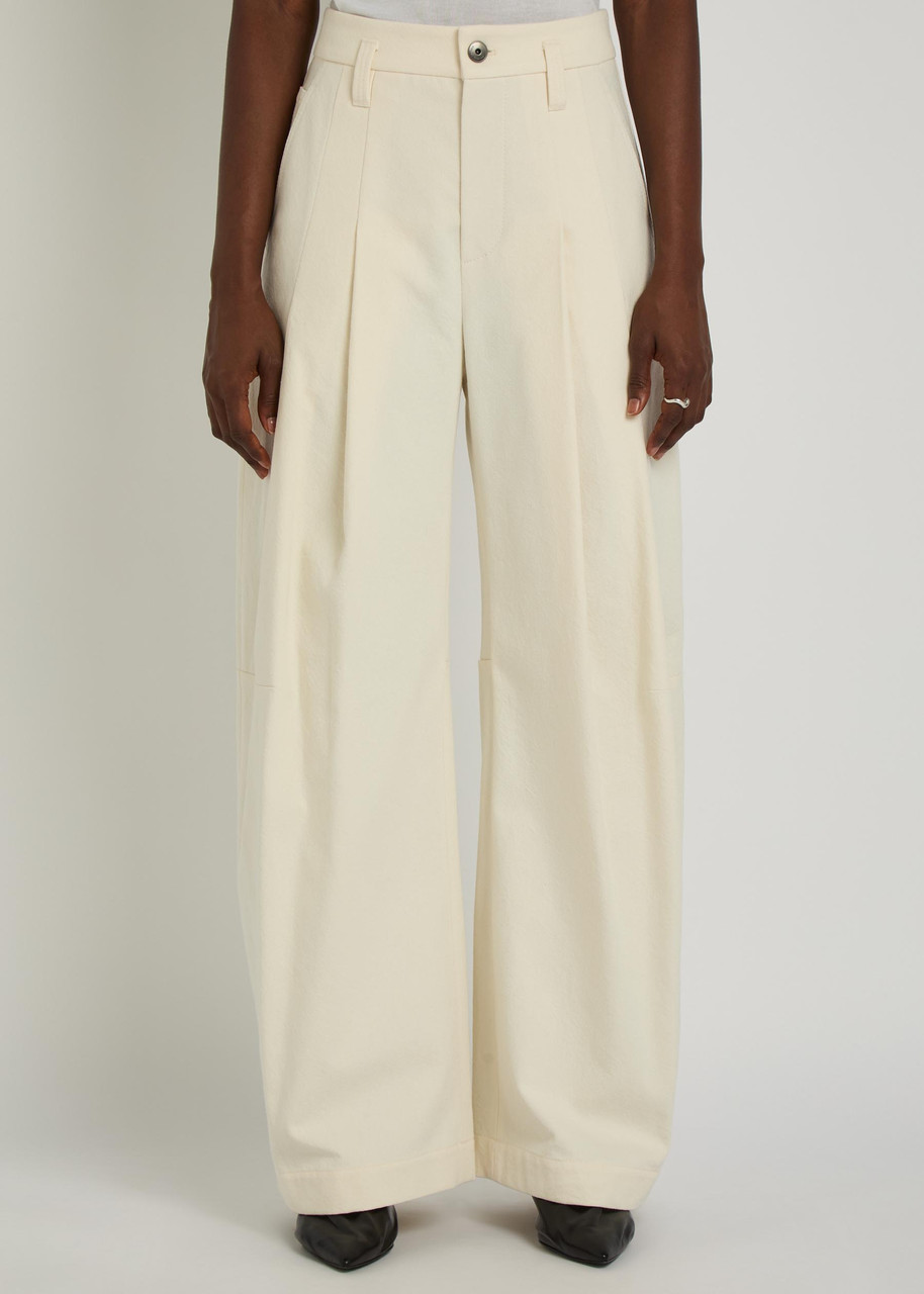 BRUNELLO CUCINELLI Pleated wide-leg cotton-blend trousers | Harvey