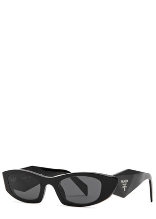 PRADA Narrow oval-frame sunglasses | Harvey Nichols