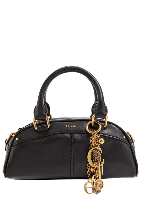 Small charm-embellished leather top handle bag