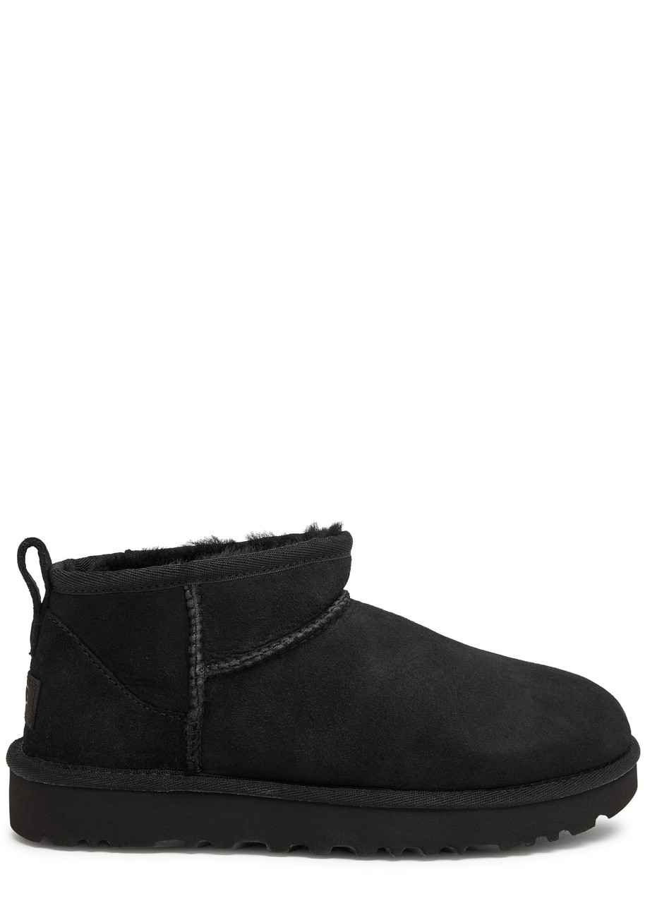 Shop Ugg Classic Ultra Mini Suede Ankle Boots In Black
