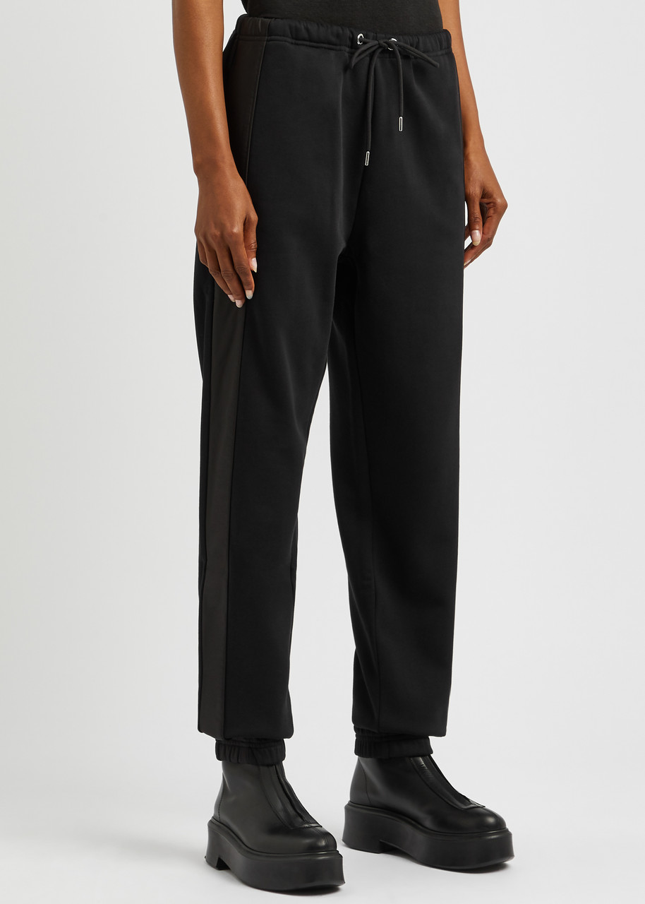 Moncler Panelled Cotton-blend Sweatpants In Black