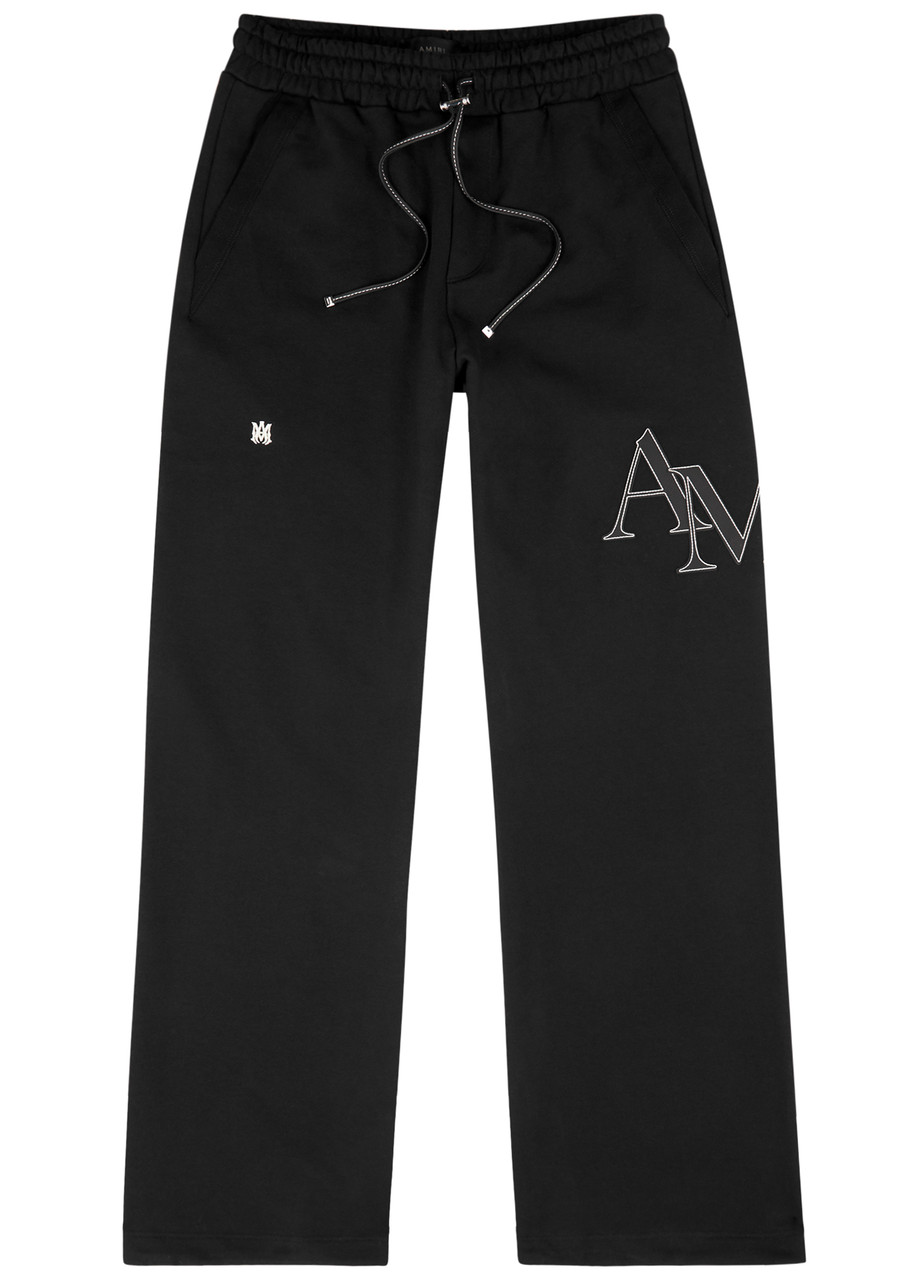 Amiri Logo-appliquéd Cotton Sweatpants In Black