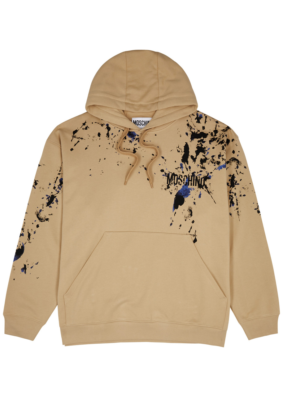 Moschino Paint-splatter Hooded Cotton Sweatshirt In Camel