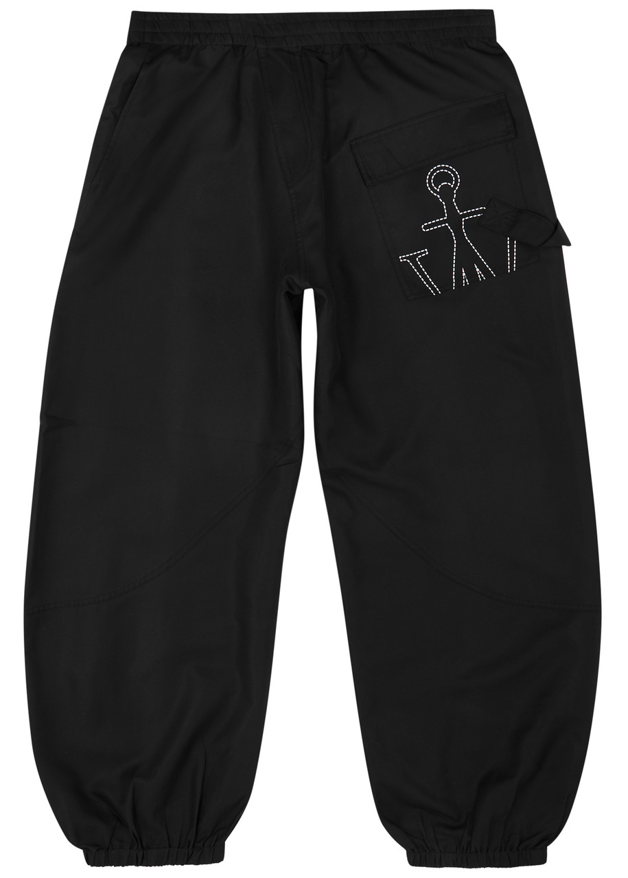 Shop Jw Anderson Twisted Logo Nylon Sweatpants In Black