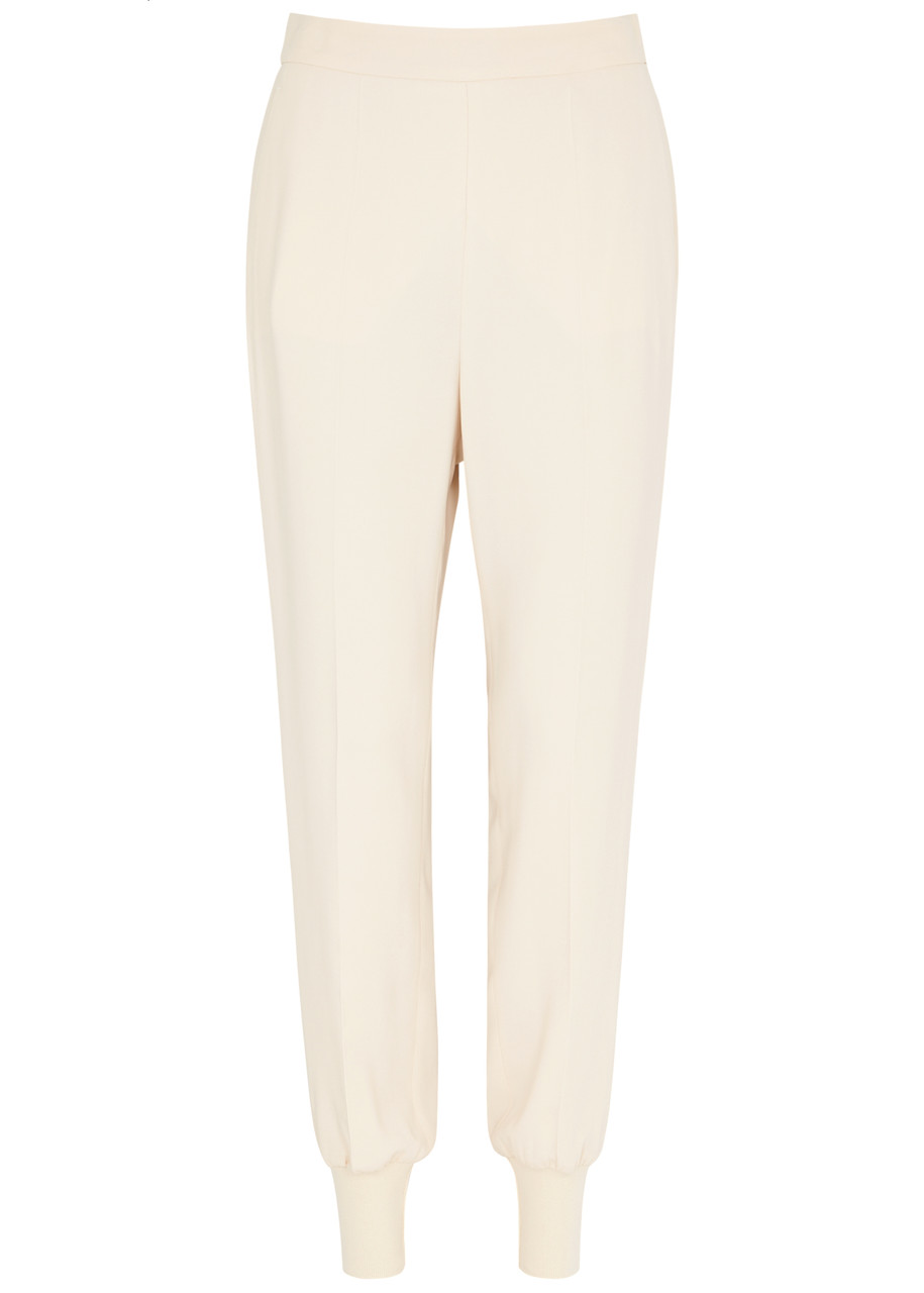 Stella Mccartney Iconic Tapered Stretch-jersey Trousers In Off White