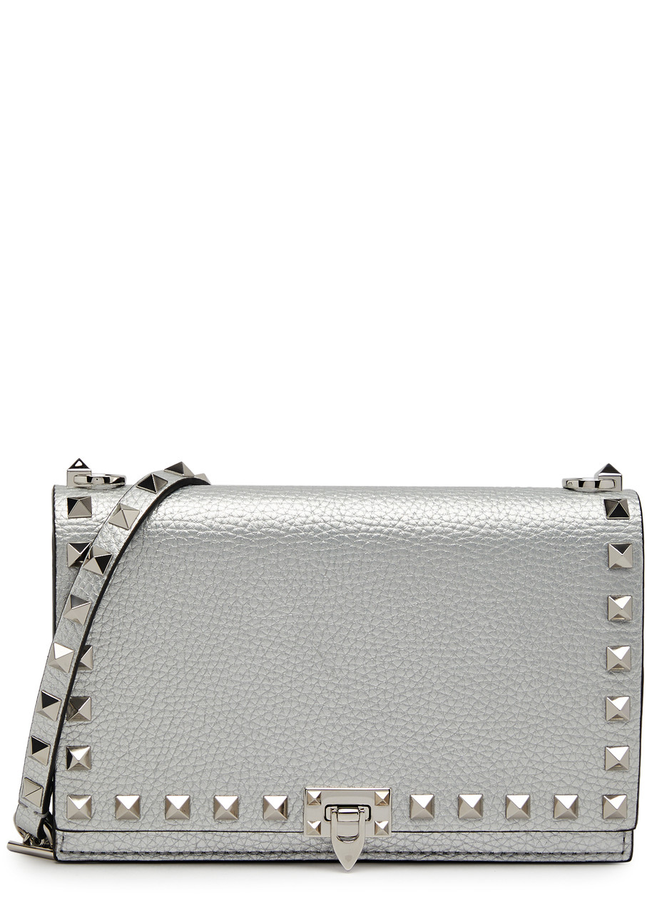 Shop Valentino Rockstud Metallic Leather Pouch In Silver