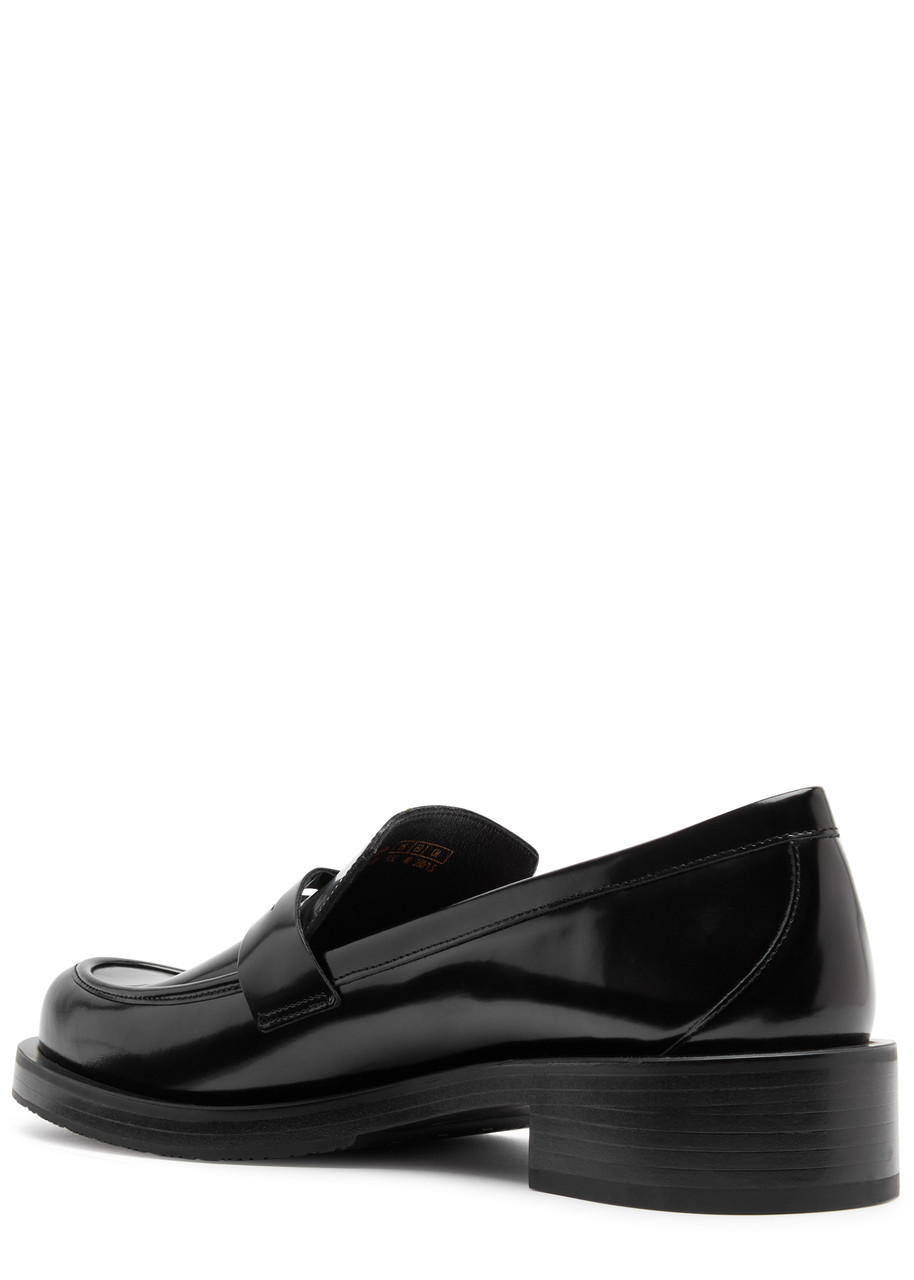 Shop Stuart Weitzman Palmer Bold 40 Glossed Leather Loafers In Black