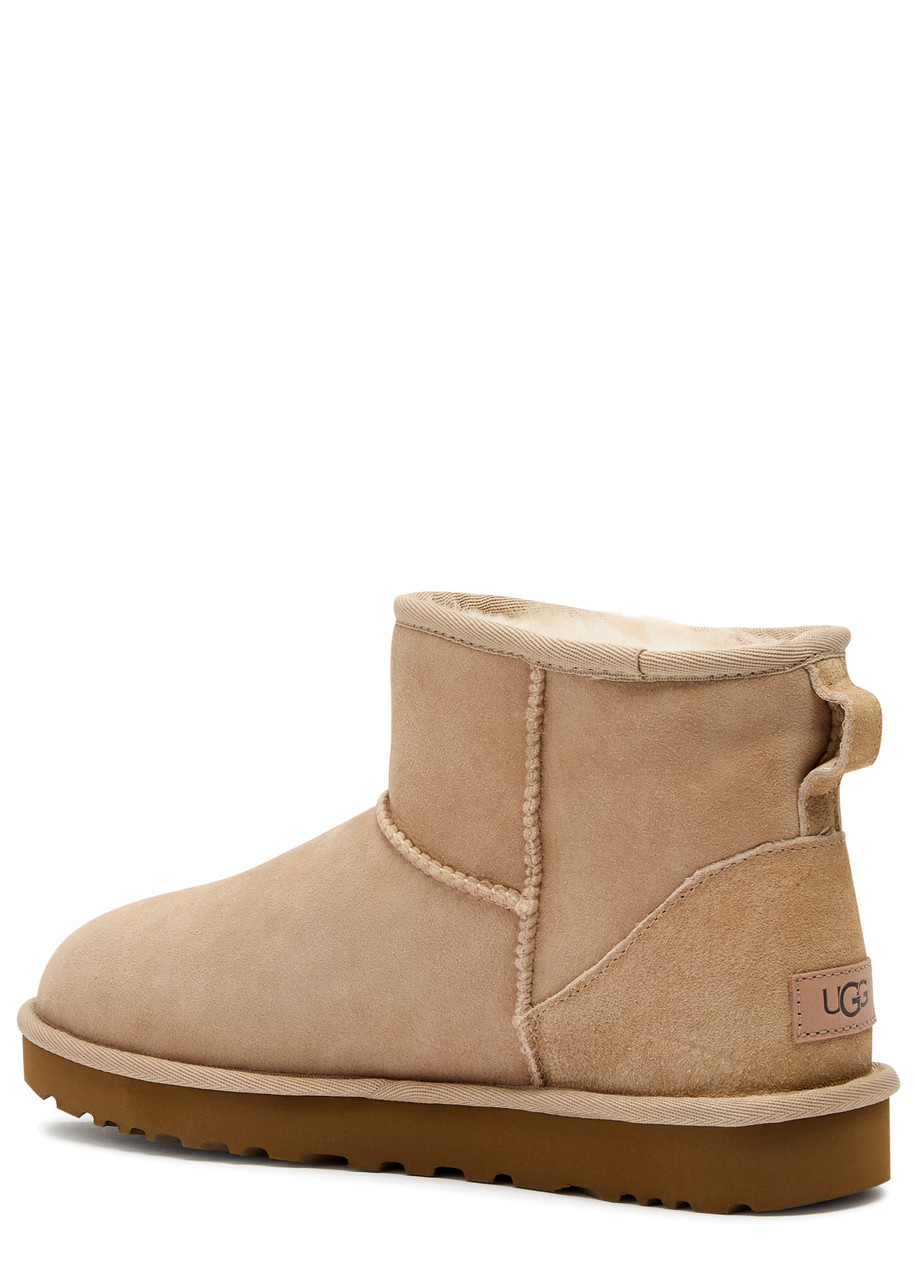 Ugg 10mm Classic Ultra Mini Shearling Boots In Sand