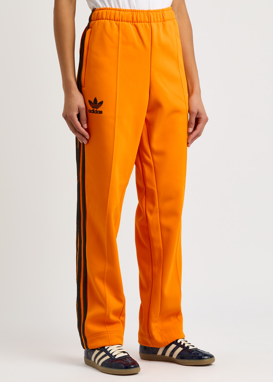 Adidas Originals Adidas X Wales Bonner Striped Logo Jersey Track Pants In Orange