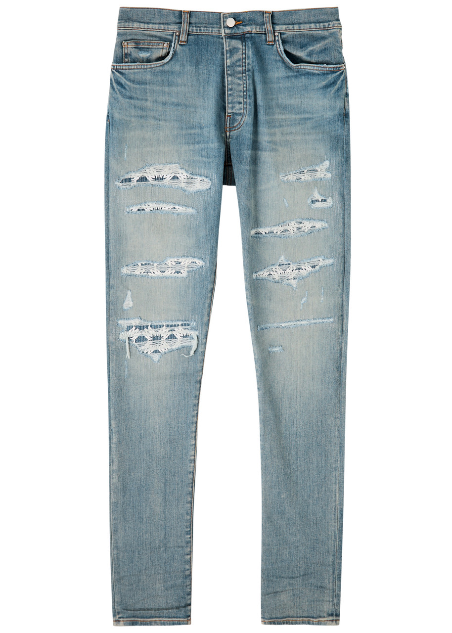 Amiri Quad Repaired Distressed Skinny Jeans - Indigo - 34 (W34 / L)
