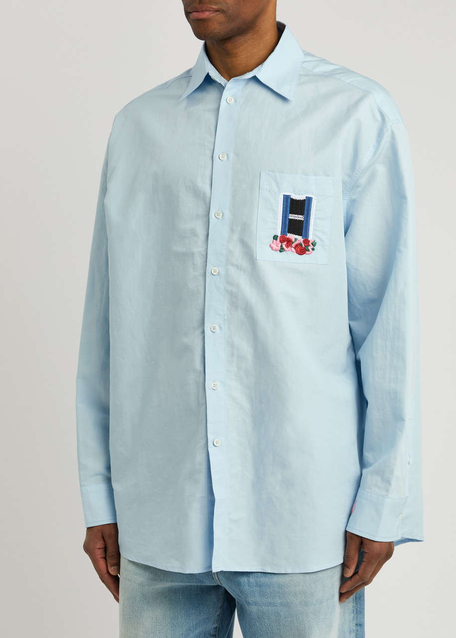 Jw Anderson Light Blue Shirt With Classic Collar And Embroidery Detail On Front And Cuff In Light Blue