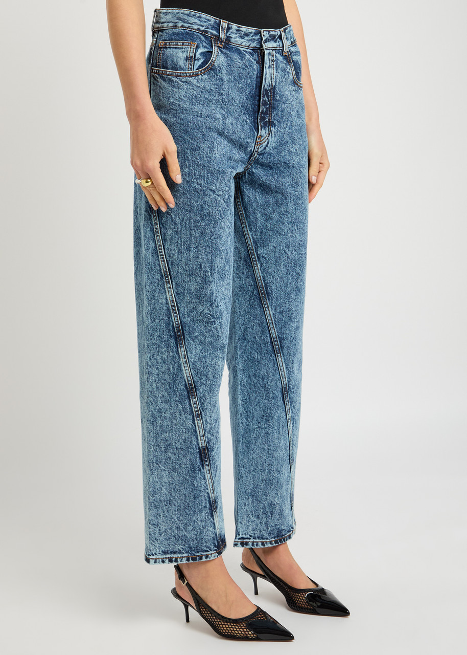 Alaïa Twisted Stonewashed Denim Jeans In Blue