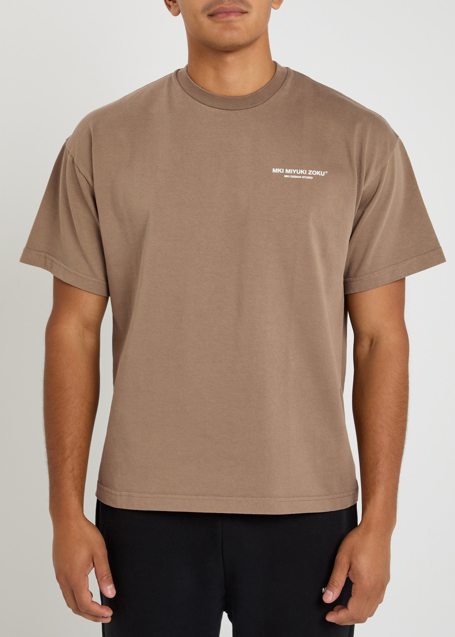 Mki Miyuki Zoku Uniform Logo-print Cotton T-shirt In Brown