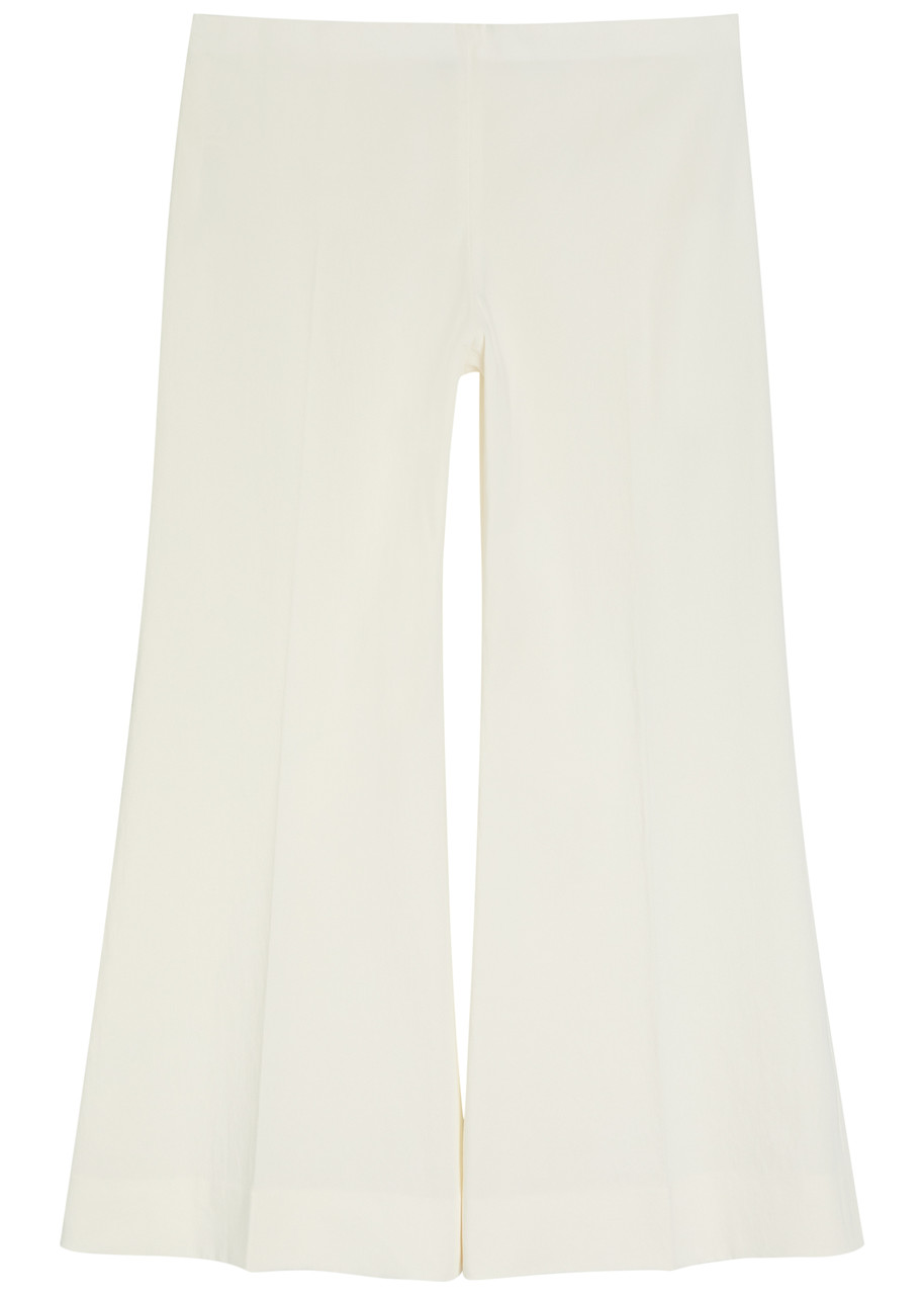 Khaite Walter Flared-leg Cotton Trousers In Pink