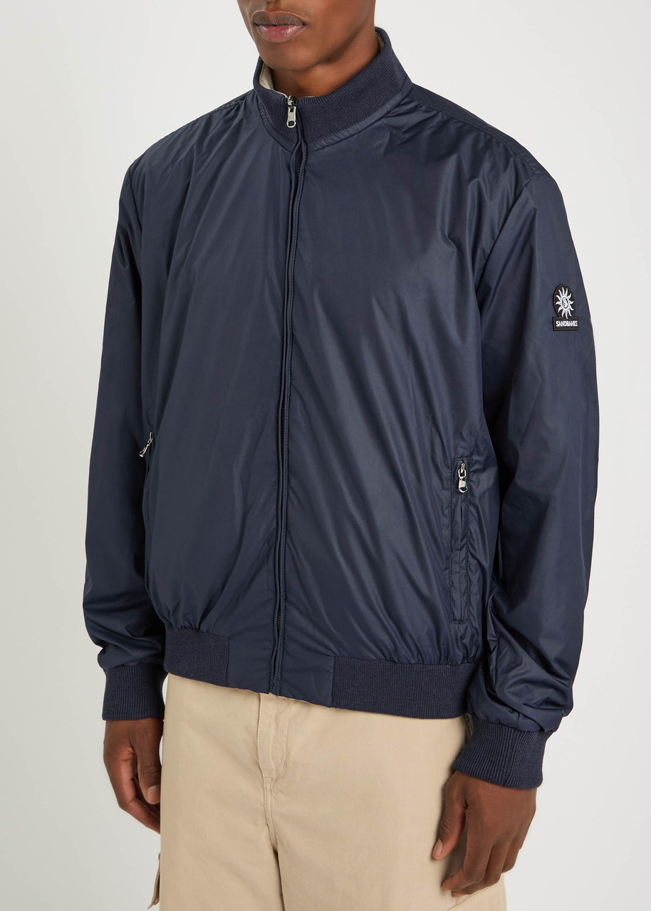 Sandbanks Reversible Logo-patch Jacket In Blue