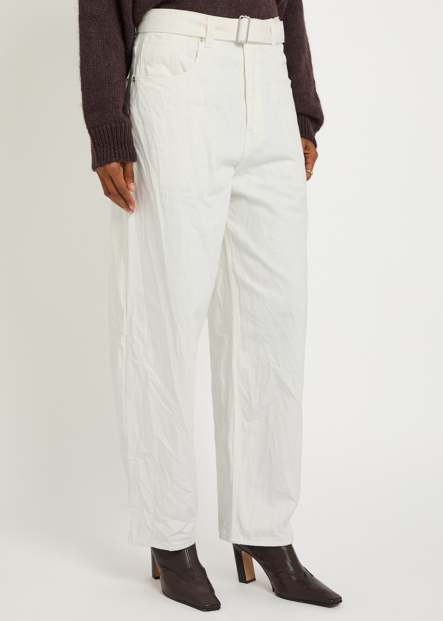 Studio Nicholson Cahun Belted Tapered-leg Jeans In White