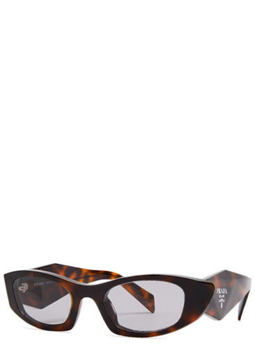 PRADA Narrow oval-frame sunglasses | Harvey Nichols