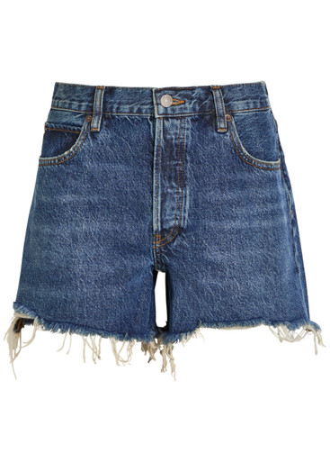 FRAME The Long Hang frayed denim shorts | Harvey Nichols
